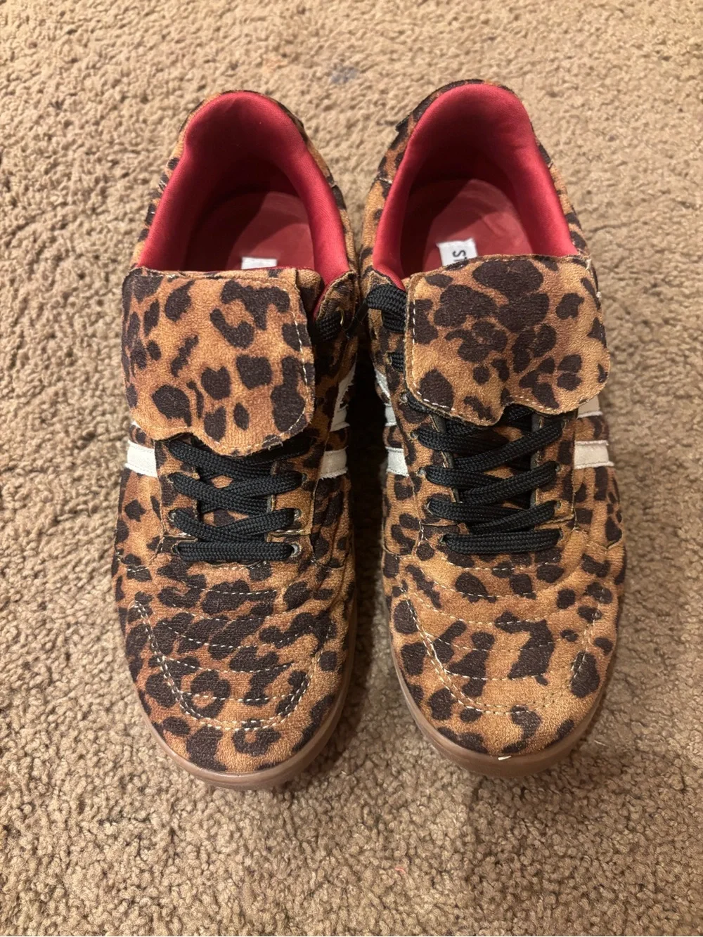 Steve Madden women’s Leopard Print Sneakers with Red Lining